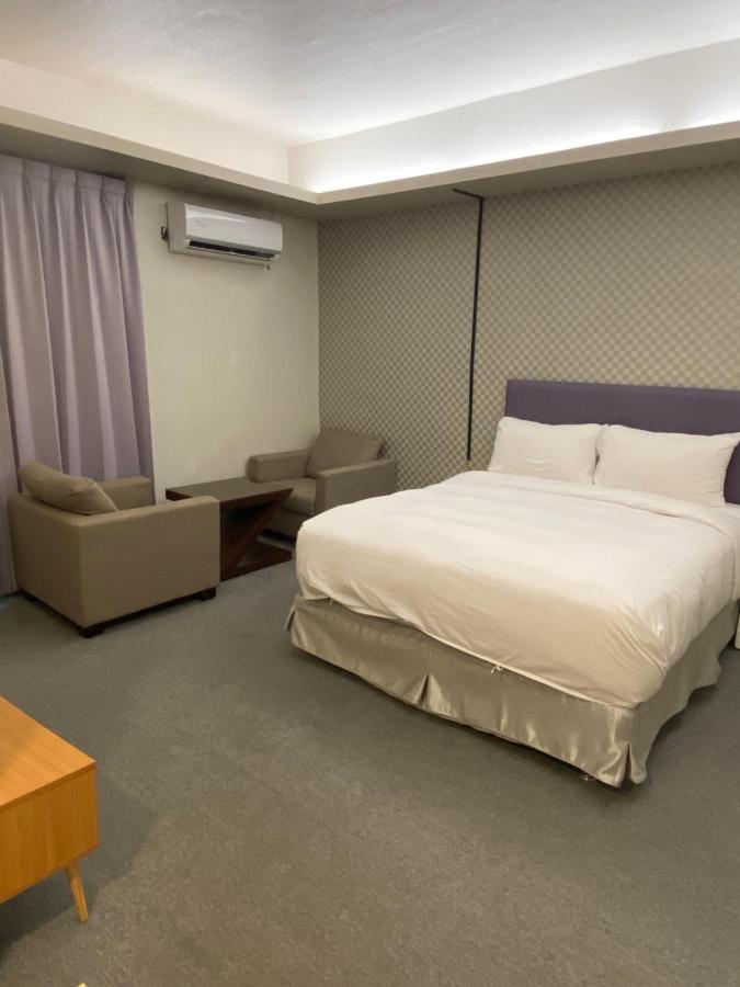 Aiyue Hotel Huwei Extérieur photo